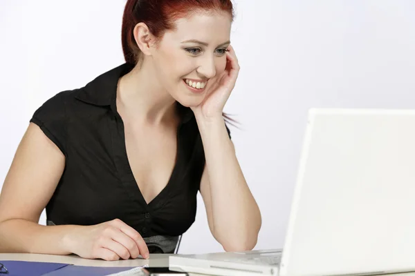 Woman working happily Stock Photo