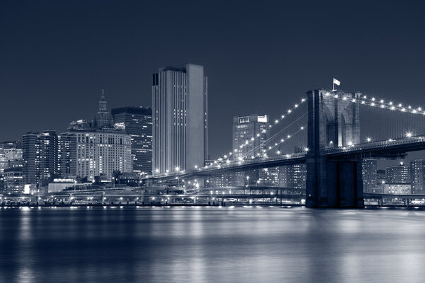 Image of Brooklyn Bridge with Manhattan skyline in the background.