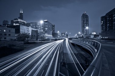 Nighttime highway traffic. clipart