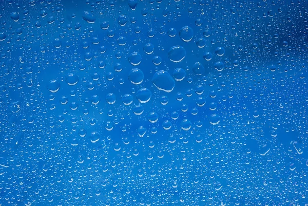 Blue drops of water — Stock Photo, Image