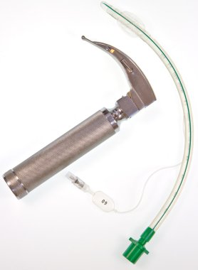 Cuffed endotracheal tube and laryngoscope clipart