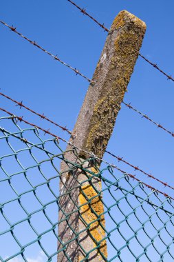 Detail of a security fence clipart