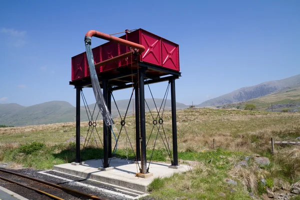 Wieża zbiornika wody do uzupełniania pary pociągów — Zdjęcie stockowe