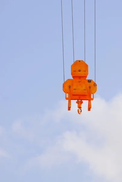 Orange heavy lift crane hook — Stock Photo, Image