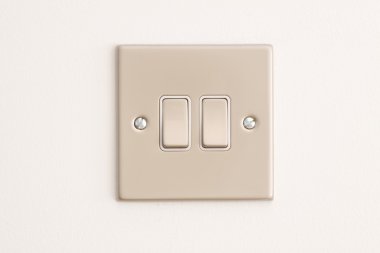 Double Lightswitch on a White Wall clipart