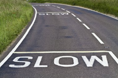 Slow signs on the road clipart