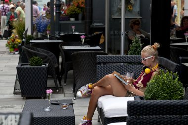 Beautiful girl in a nice cafe. Vienna, Austria. clipart