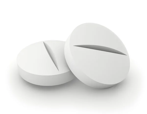 Dois comprimidos isolados sobre fundo branco . — Fotografia de Stock
