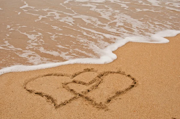 Beach and love in sand. Royalty Free Stock Images
