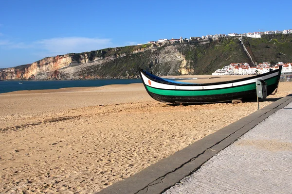 Boat on the beach in nazare — Stock Photo, Image