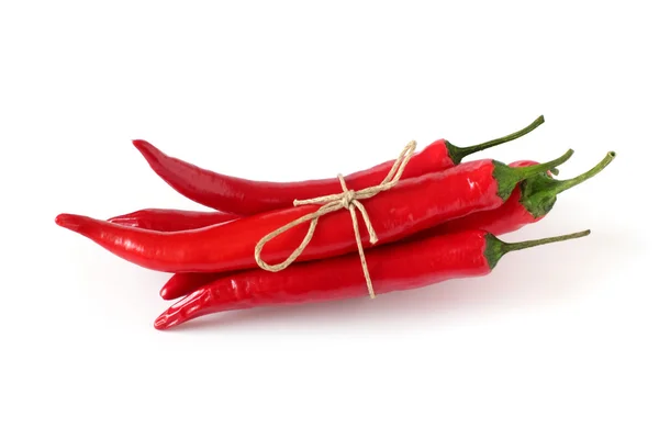 Bunch of red chili peppers isolated on white — Stock Photo, Image