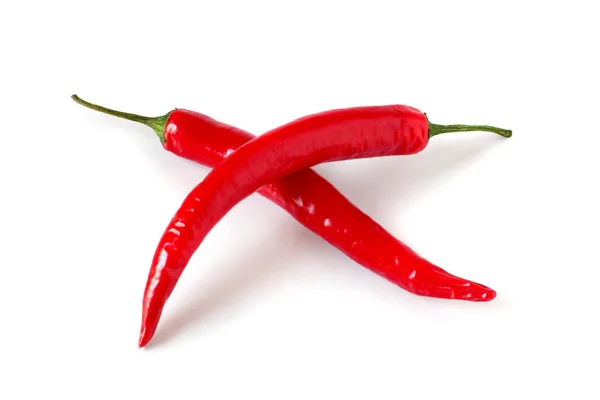 Crossed red chili peppers — Stock Photo, Image