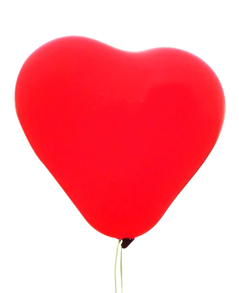 Un palloncino rosso a forma di cuore — Foto Stock