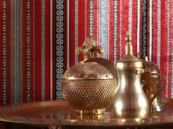 stock image Golden teapot with textured background