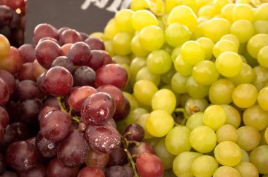 Close of Grapes green and purple clipart