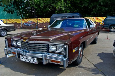 Old car show on Retrofest. Cadillac Eldorado clipart