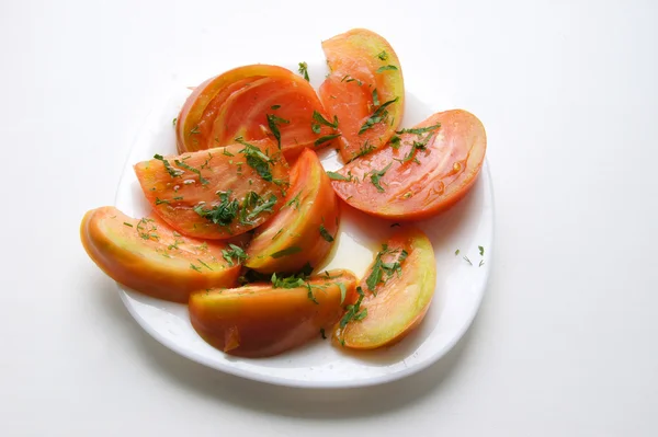 Segmenten van Oranje tomaten — Stockfoto