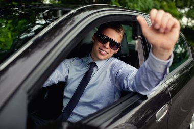 Young man his new car clipart