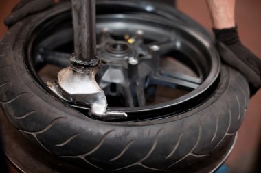 Motorcycle tire repair clipart