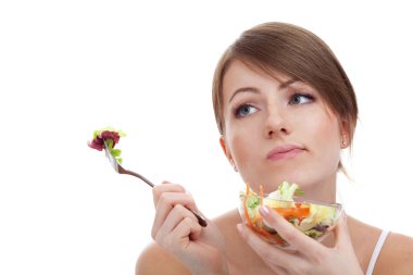 Sad woman on diet with vegetables clipart