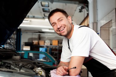 Auto mechanic based on car clipart