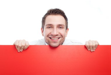 Happy businessman with blank red billboard clipart