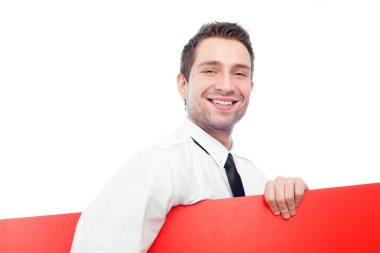 Happy businessman with blank red billboard clipart