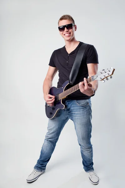 Rockstar playing on guitar — Stock Photo, Image