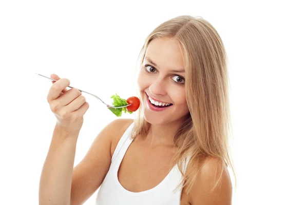 Ładna dziewczyna, jedzenie sałatka. na białym tle — Zdjęcie stockowe
