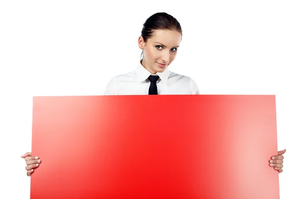 Woman with red billboard — Stok fotoğraf