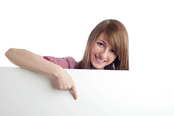 Attractive woman with blank sign. Smiling. — Stock Photo, Image