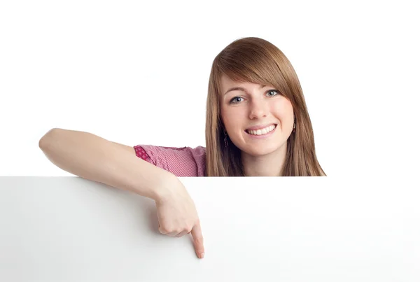 Attraktive Frau mit leerem Schild. Lächelnd. — Stockfoto