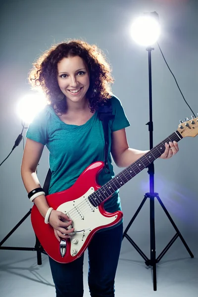 Female beauty playing guitar — Stock Photo, Image