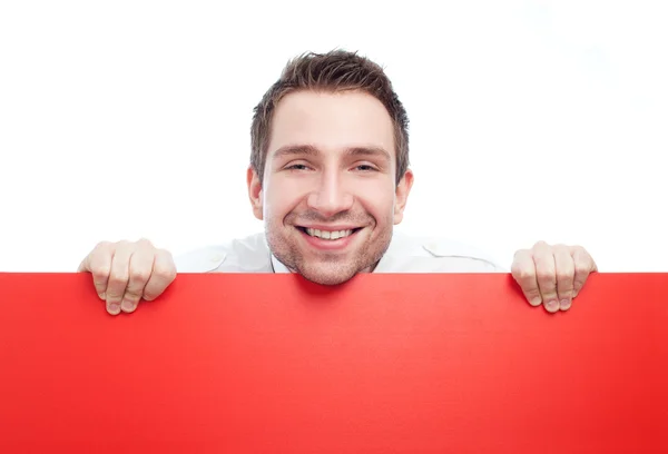 Boldog üzletember, üres piros billboard — Stock Fotó