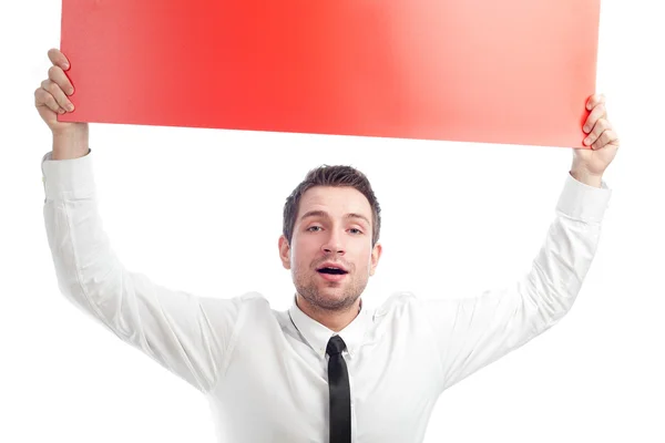 Glücklicher Geschäftsmann mit leerer roter Plakatwand — Stockfoto