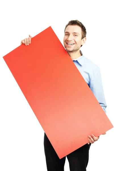 Happy student with blank red billboard — Stock Photo, Image