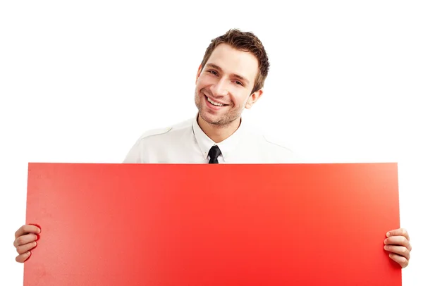 Empresário feliz com cartaz vermelho em branco — Fotografia de Stock