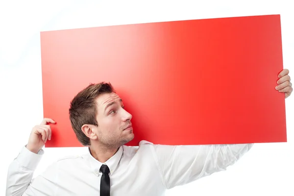 赤い看板とびっくり実業家 — ストック写真