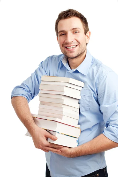 Happy student stojící s knihami — Stock fotografie
