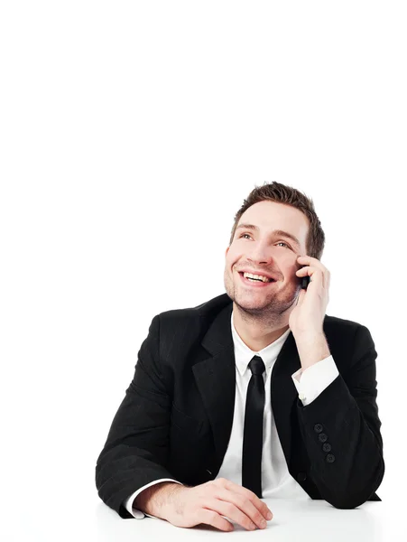 Счастливый бизнесмен с мобильного телефона — стоковое фото