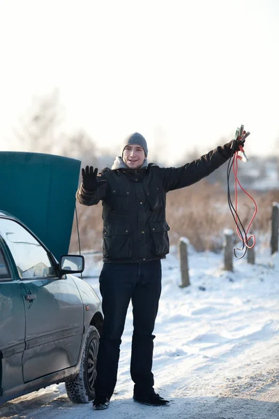 stock image Man with broken car in winter