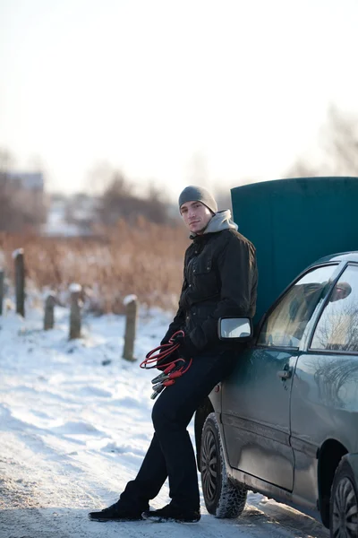 stock image Man with broken car in winter