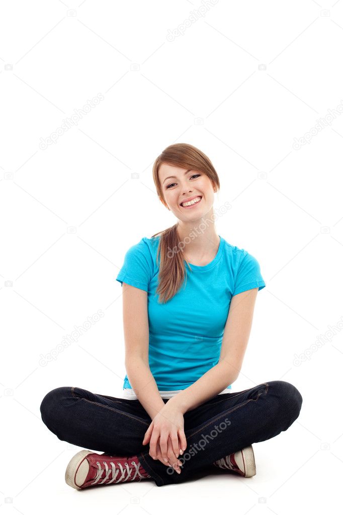 Pretty female student sitting Isolated
