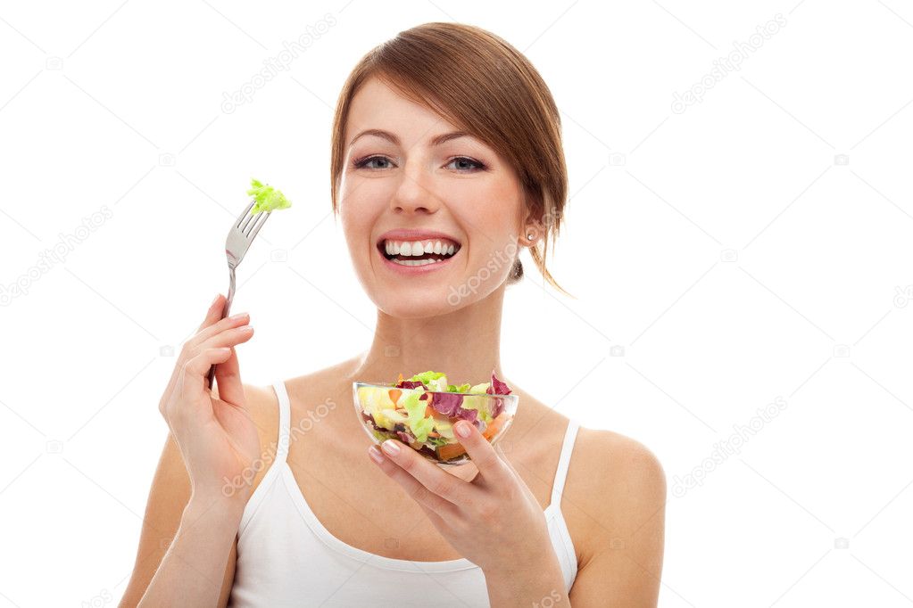 Woman with salad on fork, isolated