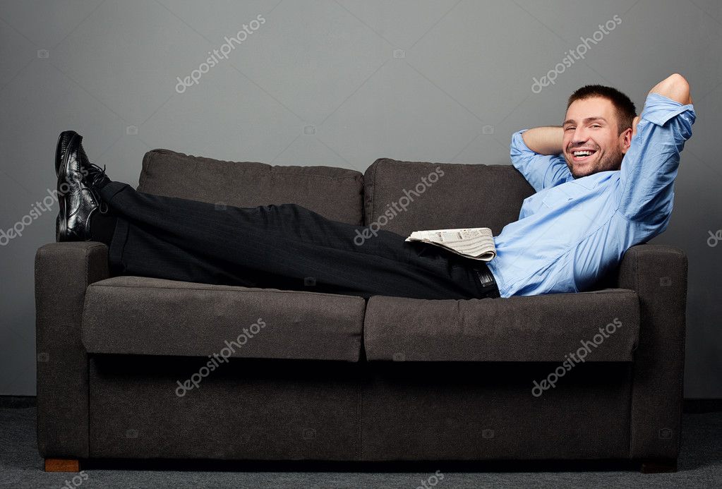 Businessman on sofa Stock by ©baranq 11987095