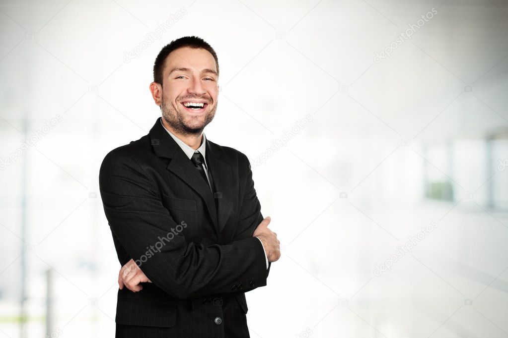 Happy businessman smiling
