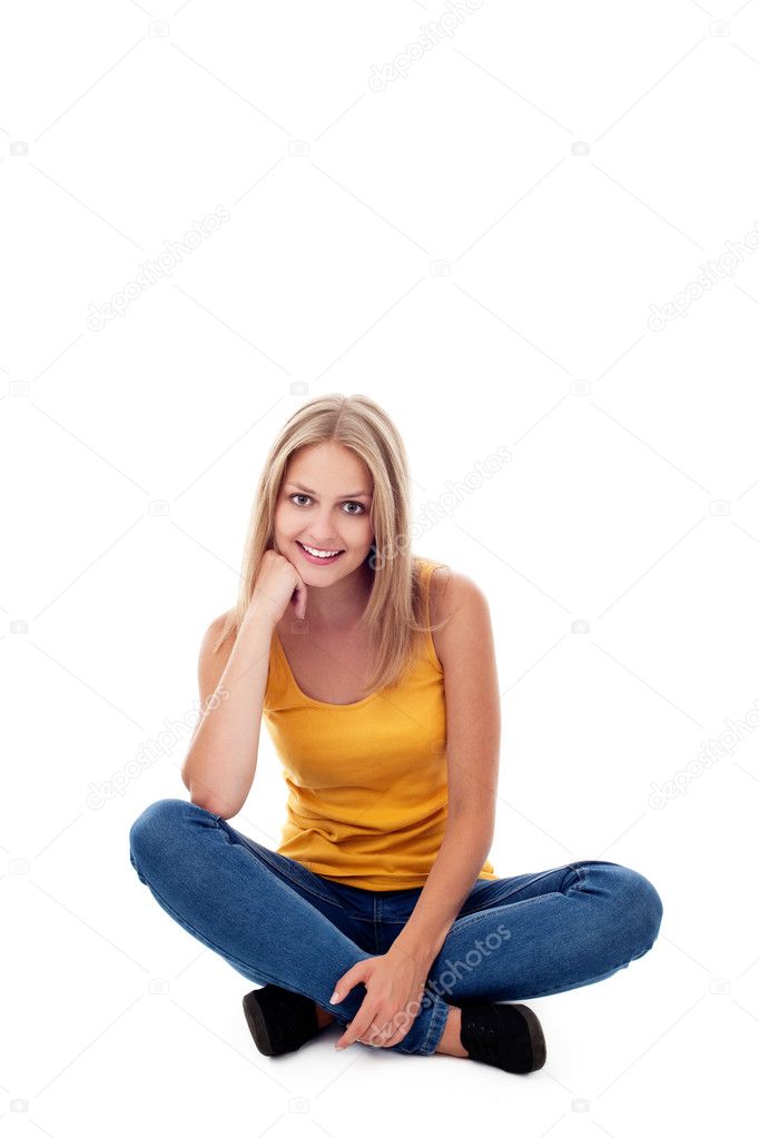 Young woman sitting isolated
