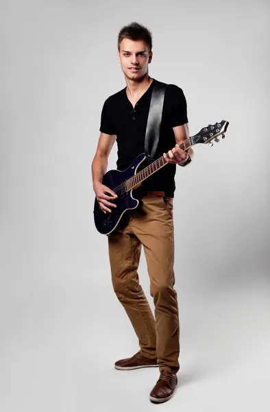 Musican rock star playing guitar — Stock Photo, Image