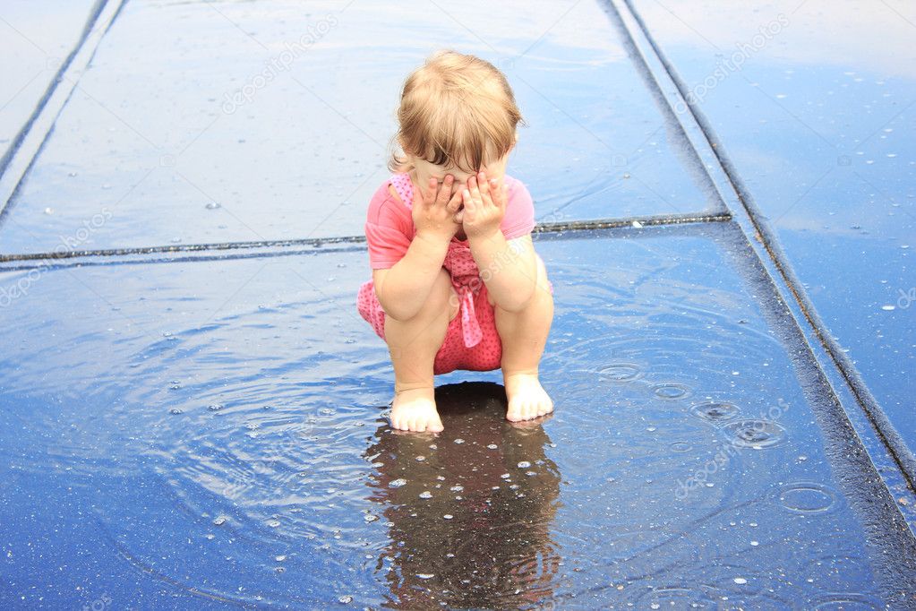 A Beautiful Little Girl In The Rain Stock Photo By ©kostia777 11301674