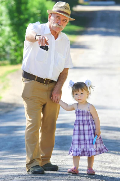 Grandfather and granddaughter — Stock Photo, Image